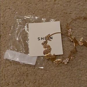 Gold hoop earrings with butterflies